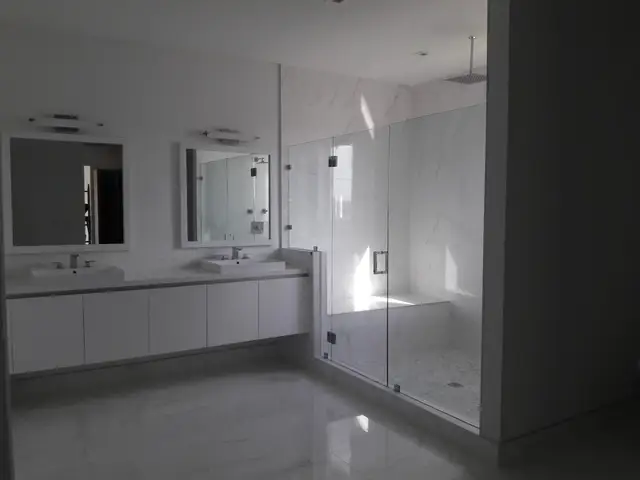 Remodeled bathroom with glass shower in Hollywood, FL