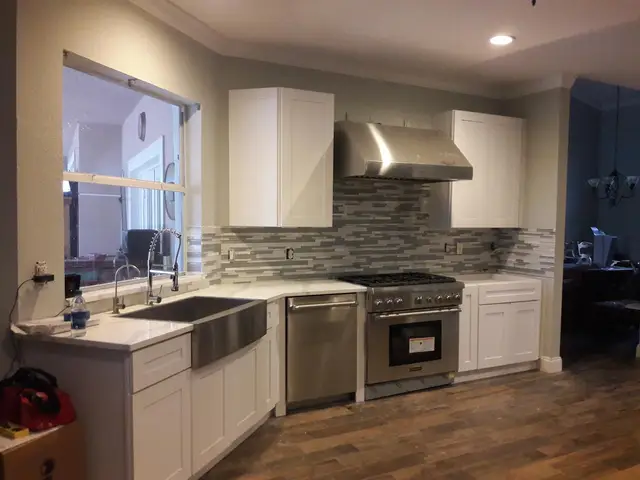 Kitchen cabinets staged for installation