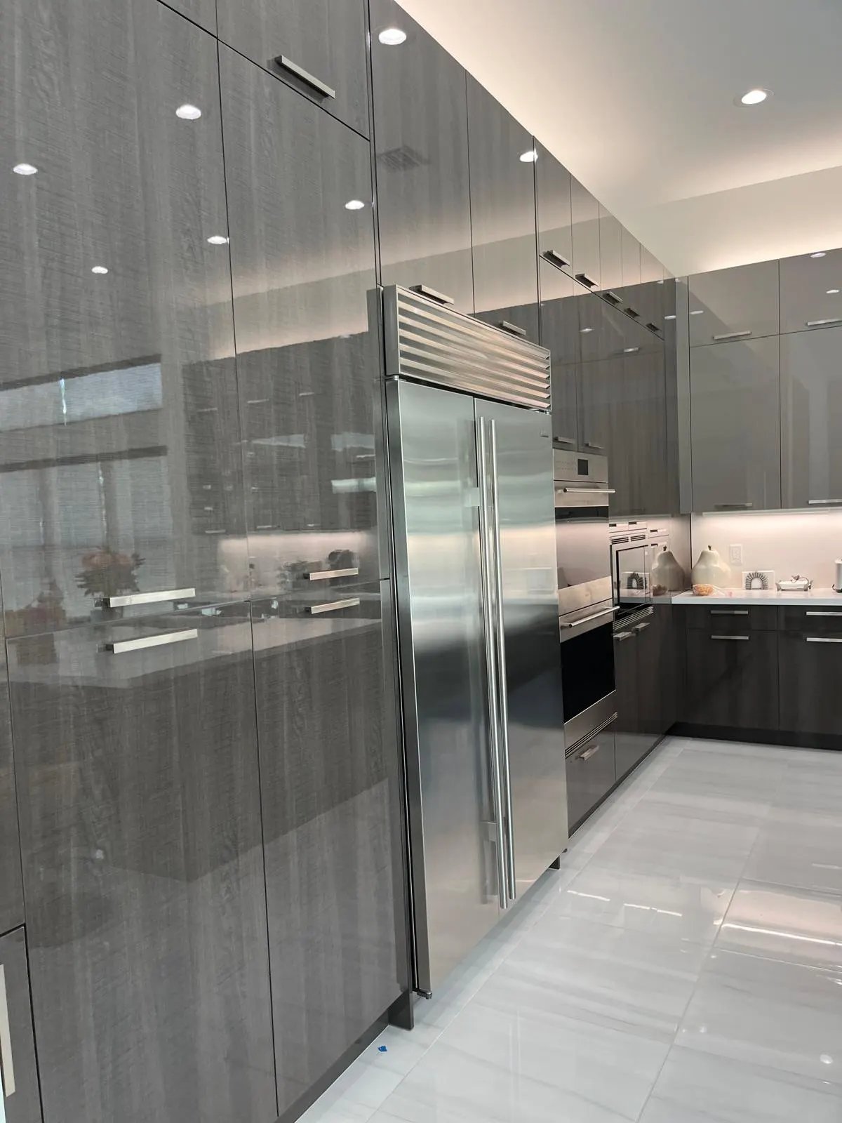 High-gloss gray kitchen remodel in Broward County, FL